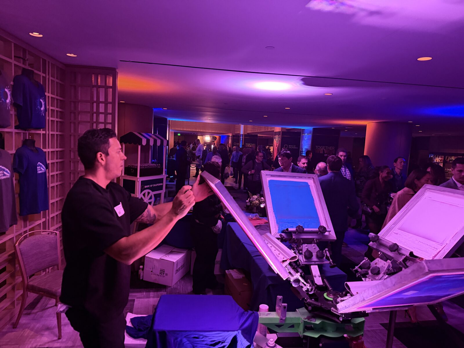 Live printing station glowing at an evening corporate gala
