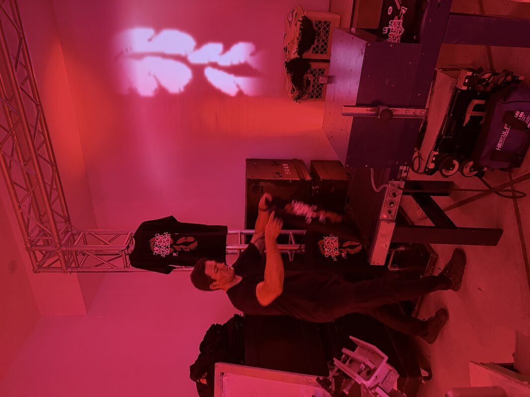 Branded merch on display at a corporate event station